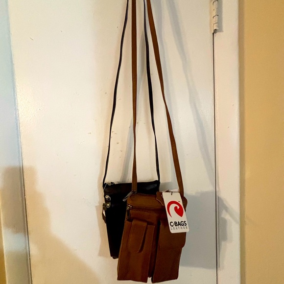 Handbags - Perfect for theme parks or other outings. Many pockets and zipper compartments.